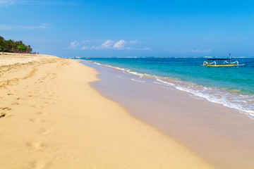 Sea view from tropical beach with sunny sky in Bali.