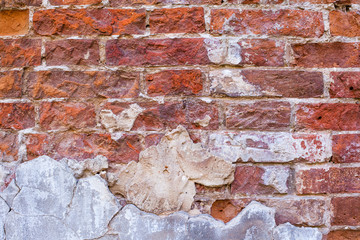 old brick wall with stucco