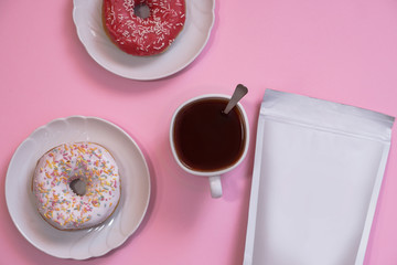 Template of paper ecological bag for storing coffee, tea and donuts with a cup of cappuccino. Vacuum packaging for christmas and new year present