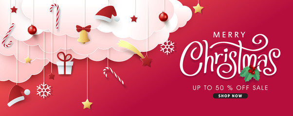 Naklejka premium Christmas composition in paper cut style sale banner background.Merry Christmas text Calligraphic Lettering Vector illustration.