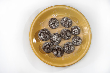 Beautiful round cookies on a plate in a sweet glaze. Winter Christmas and New Year theme