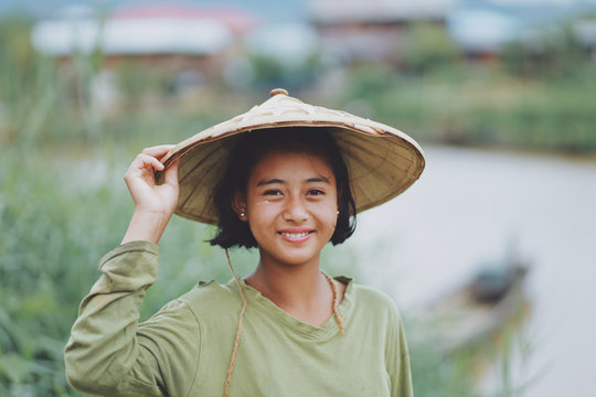 Portrait of Asian Beautiful Burmese girl farmer in Myanmar