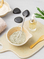 Spa and wellness composition with serum, towels and beauty products