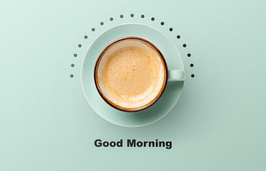 Blue cup with cappuccino over blue background