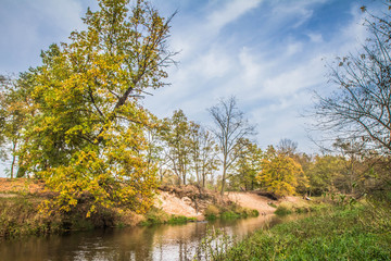 Fototapeta na wymiar Swider river in Masovia, Poland in autumn