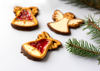 Naklejka na ściany i meble Gingerbreads with Christmas decoration on white background 