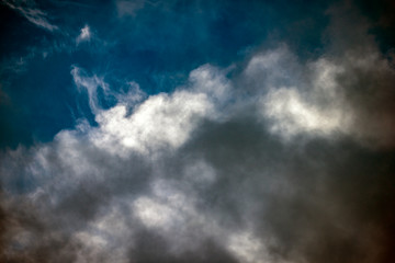 Naklejka na ściany i meble fluffy clouds in the blue skye, sweden