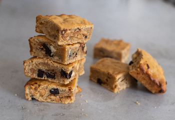 Blondie brownies with peanut butter and white chocolate. Homemade, delicious dessert.