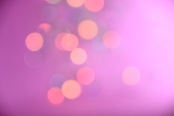 Colorful bokeh and pink background for background.