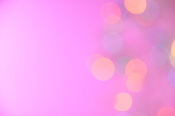 Colorful bokeh and pink background for background.