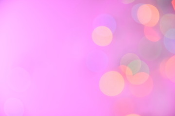 Colorful bokeh and pink background for background.