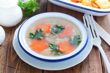 Fish aspic in an enameled bowl, selective focus