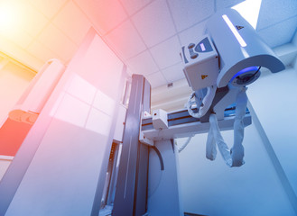 X-ray room in a hospital. Classic ceiling-mounted x-ray system.