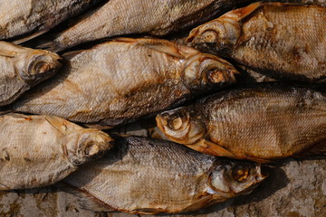 conceptual flat background of dried fish. vobla