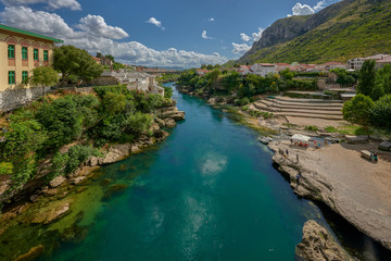 Naklejka na ściany i meble Neretva River in the city of Mostar in Bosnia and Herzegovina