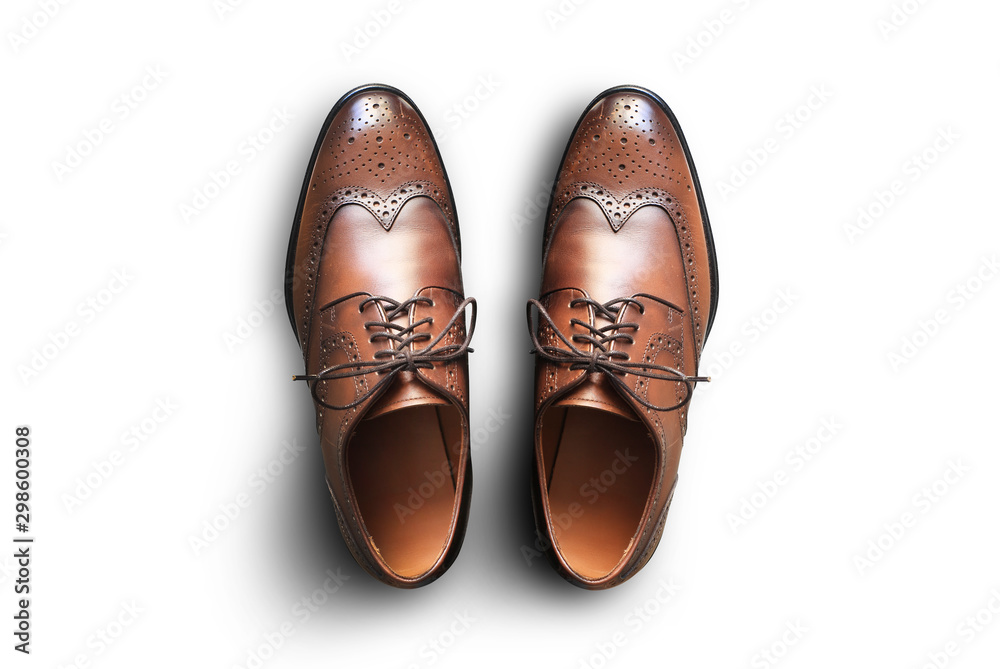 Wall mural Brown leather men's shoes in classic style