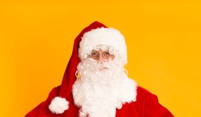 Santa Claus human face on bright orange background
