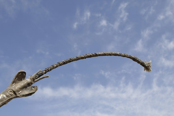 Kazakh Kamsha - a homemade horse lash made of leather with a wooden handle;