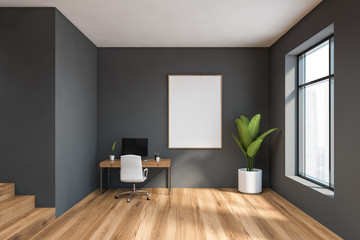 Fototapeta premium Comfortable gray home office interior with poster