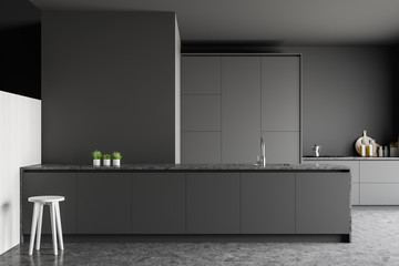 Gray kitchen with bar stool