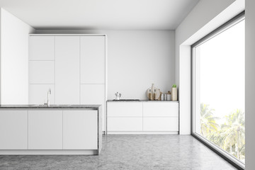 Modern white kitchen interior with bar