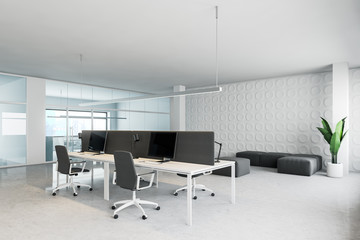 White and glass open space office with lounge