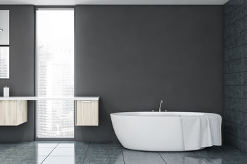 Fototapeta na wymiar Gray bathroom with tub and shelves