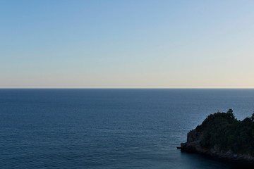 Sea before sunset. Sea horizon at sunset .