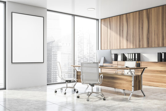 White and wooden CEO office corner with poster