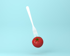 Creative layout tomato concept on pastel blue background. minimal idea food and fruit concept.