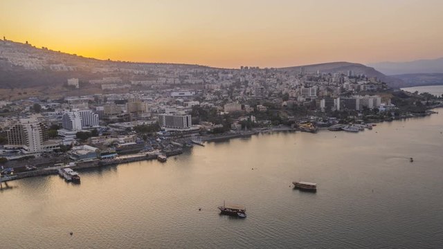 [Hyperlapse] Sunset over the promenade of Tiberias in Israel, 4k aerial view