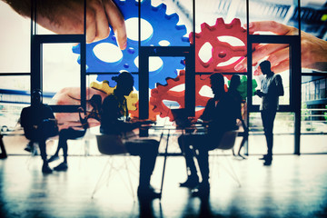 Business team connect pieces of gears. Teamwork, partnership and integration concept. double exposure with light effects - obrazy, fototapety, plakaty