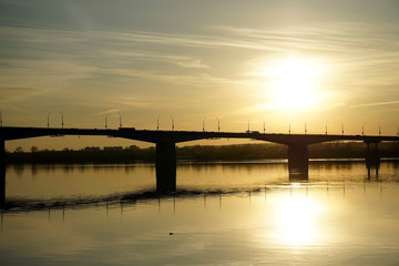 Long bridge over a wide river close-up