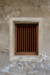 Fototapeta premium Old vintage traditional wooden window and cement wall