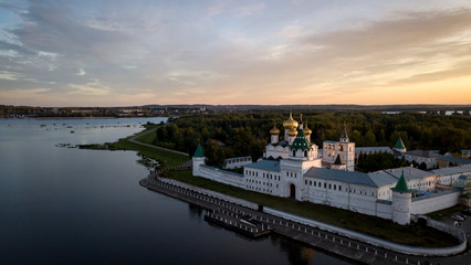 Kostroma. Gold ring of Russia. The monastery of St. Ipaty. Clouds in the evening sky and the Volga river.