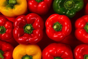 Fresh red, green, yellow bell pepper background.