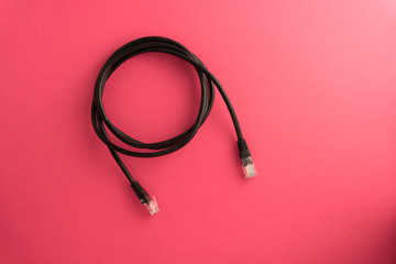 LAN black on a pink background.