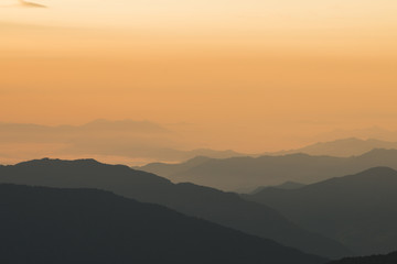 mountain range in nepal during sunset