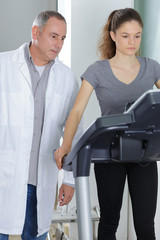 Obraz premium podriatist checking female patient