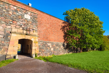 Fototapeta na wymiar Finland. Helsinki. Fortress Suomenlinna. Sveaborg. Europe. Gates in the walls of the fortress. Sightseeing tours in Sveaborg fort. Military monument. Fortifications of the fort. Scandinavian country.