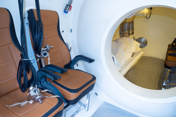 Pressure chamber for divers. Diving. Imitation of immersion in water. Diving in depth. Single pressure chamber. Industrial diving. Depth safety. Outfit. Divers training. Training for divers.