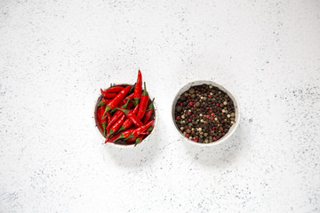 Red hot chilli peppers. background with red chili peppers on light background.