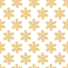 Golden snowflakes seamless pattern on white background