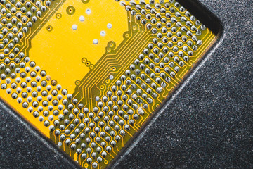 Processor pins macro. computer motherboard close up. cpu pins on a circuit board. computer central...