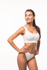 Fototapeta premium Young pretty woman wearing lingerie isolated on white background
