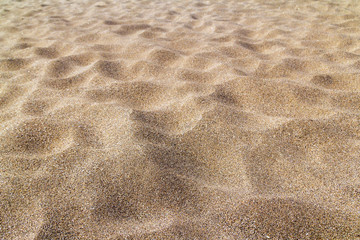 Close-up beach sand in the summer.Dune-shaped .Desert.