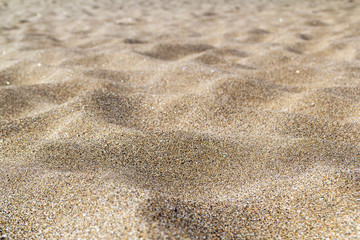 Fototapeta na wymiar Close-up beach sand in the summer.Dune-shaped .Desert.