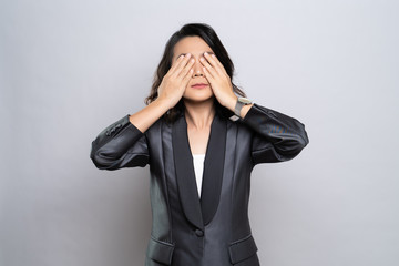 Businesswoman has eyes pain isolated over white background