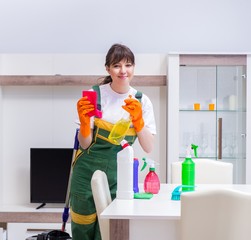 Professional cleaning contractor working at home