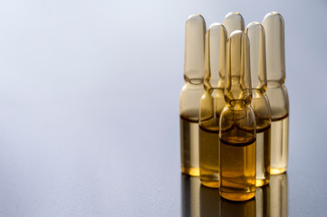 Close-up glass ampoules with medicine